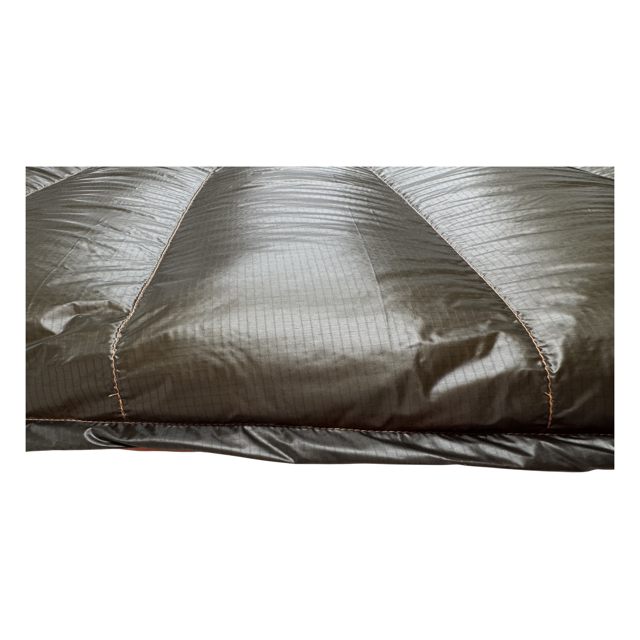 Close-up of the dark olive Argon 67 ripstop shell and baffle stitching on the Big Meadows Ultralight 20° quilt