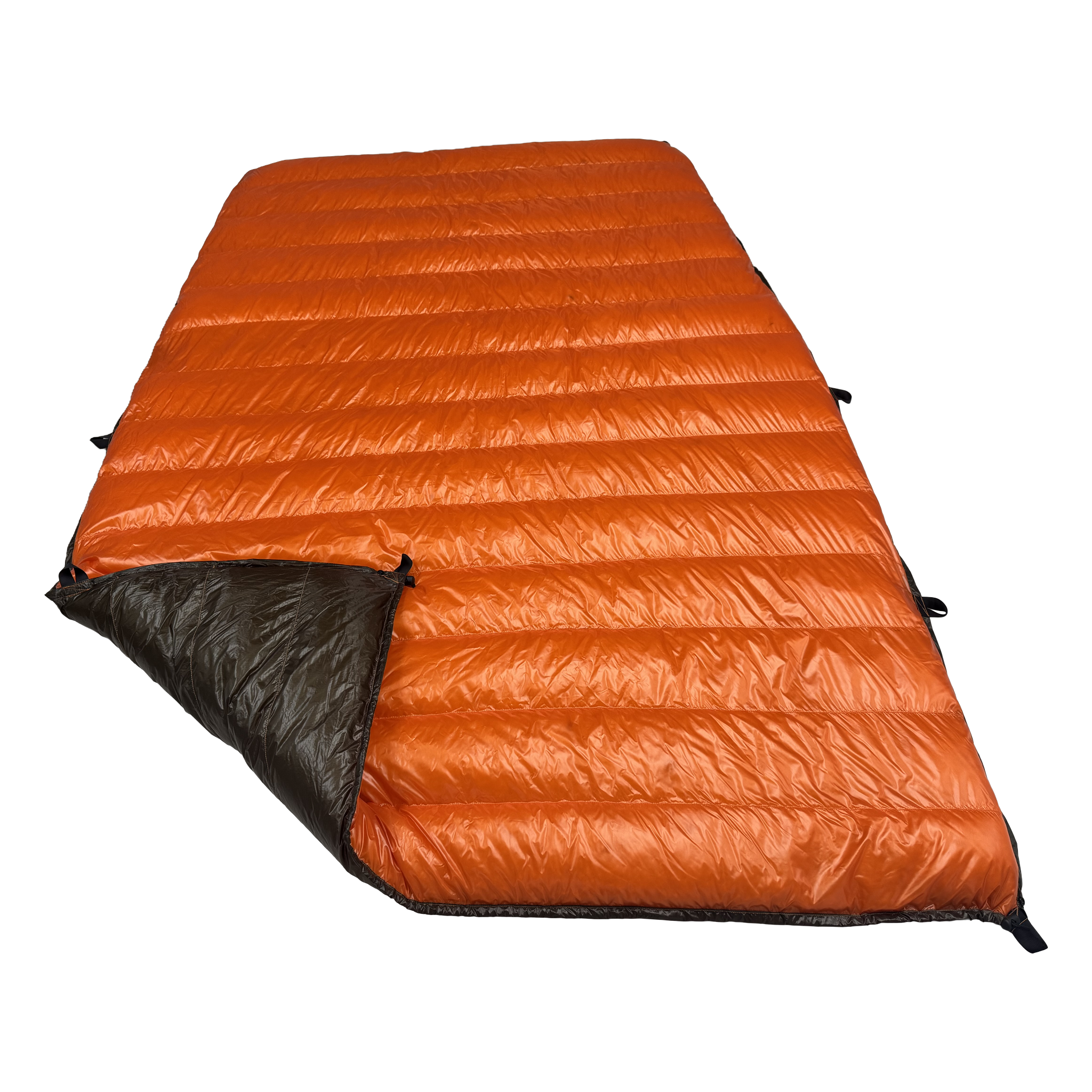 Big Meadows Ultralight 20° quilt burnt orange side up with the dark olive shell folded back at the foot end