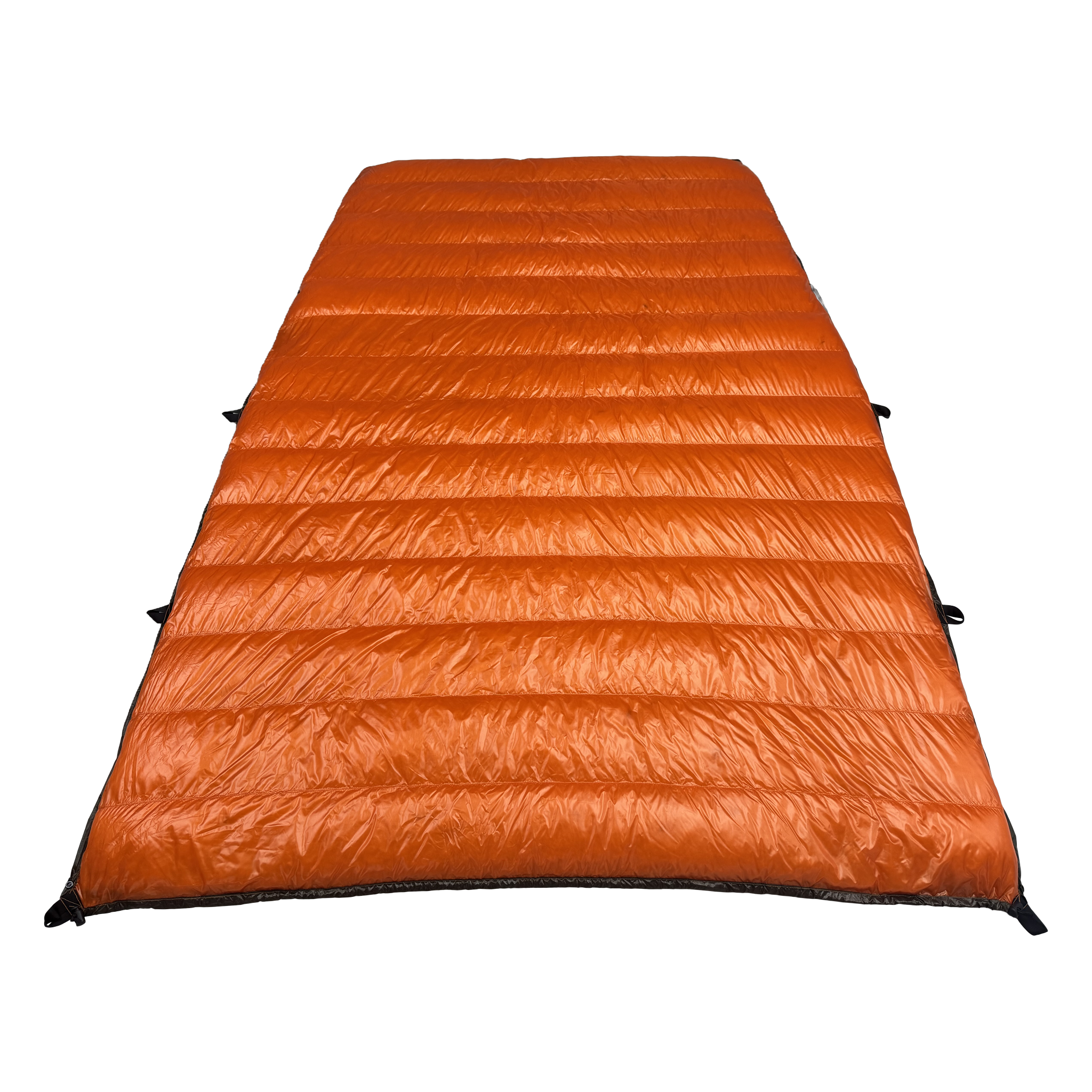 Big Meadows Ultralight 20° quilt open showing the full burnt orange interior and sew-through baffles filled with 1000 fill power down