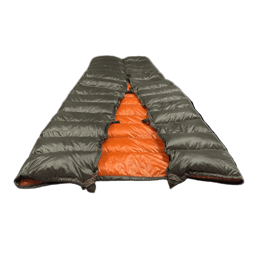 Big Meadows Ultralight 40° summer backpacking quilt laid flat, dark olive outer shell with burnt orange interior, wide half-taper design