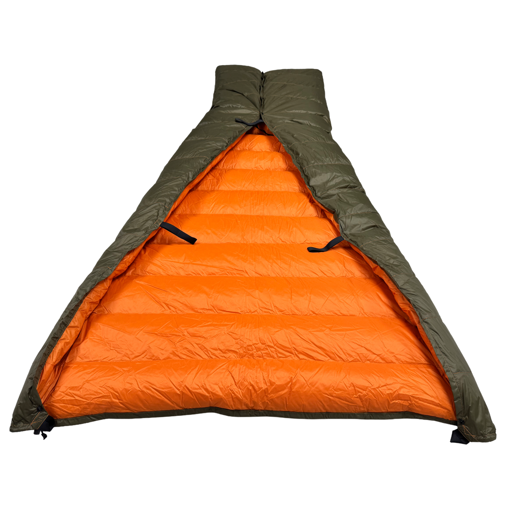 Jacks R Better Hudson River 20 degree camping quilt with the footbox formed, revealing the full orange interior lining and attachment loops for hammock underquilt or sleeping bag use