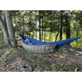 Jacks R Better Mt Washington 3 20°F three-season hammock underquilt hung beneath a camping hammock