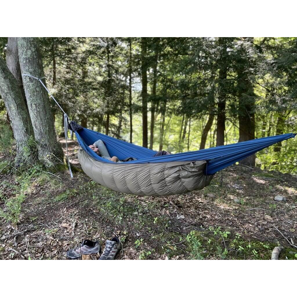 Jacks R Better Mt Washington 3 20°F three-season hammock underquilt hung beneath a camping hammock