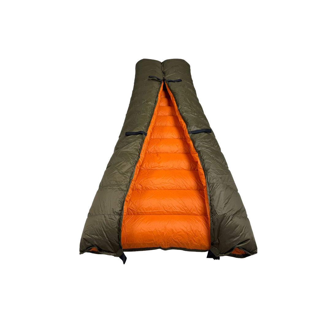 Jacks R Better Old Rag Mountain 0 degree camping quilt with the footbox formed, revealing the full orange interior lining and attachment loops for hammock underquilt or sleeping bag use