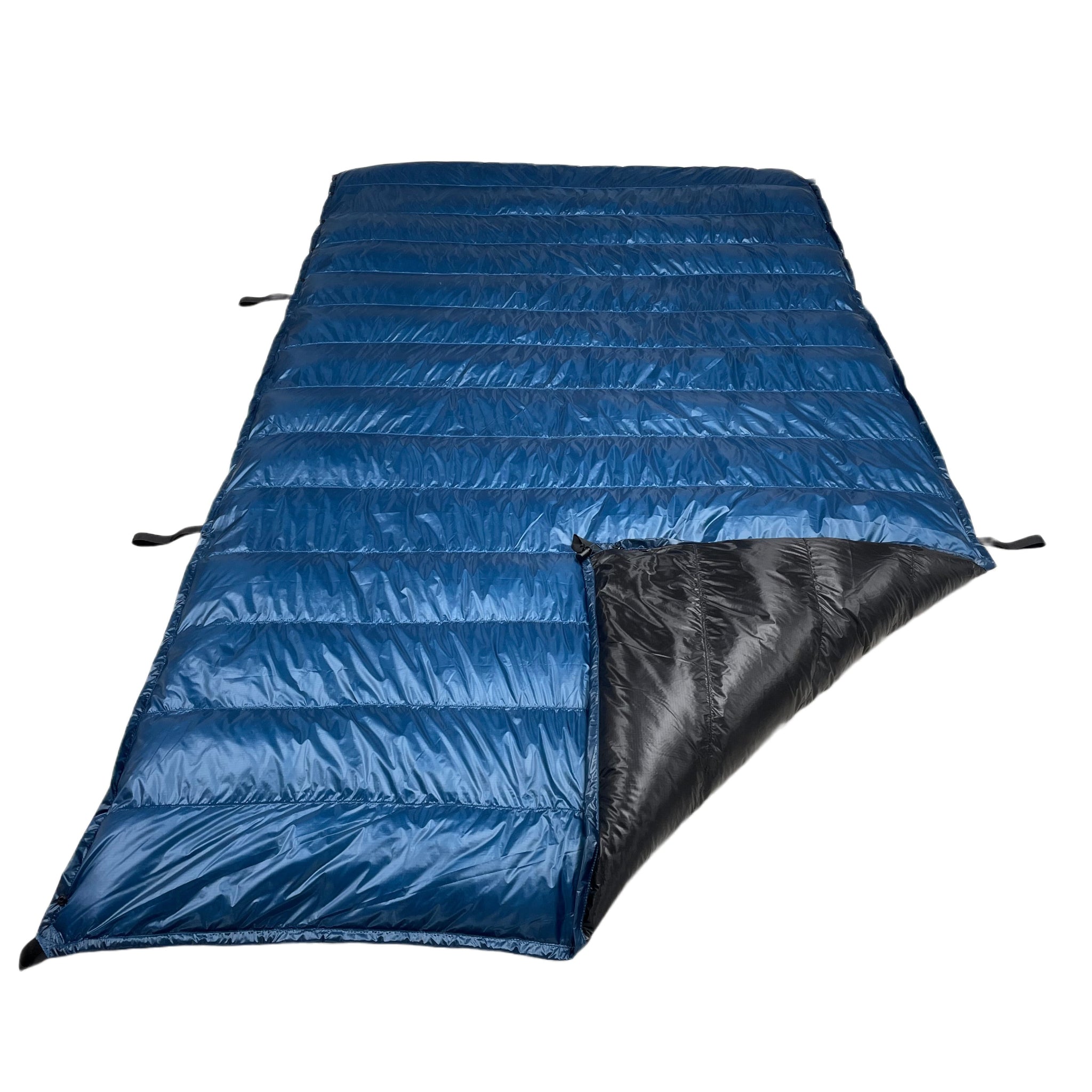 Jacks R Better Shenandoah Ultralight 40 degree backpacking quilt flat lay showing Moroccan Blue Argon 67 ripstop shell and attachment loops