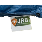 Close-up of the woven Jacks R Better logo tag on the Shenandoah Ultralight 40 degree backpacking quilt