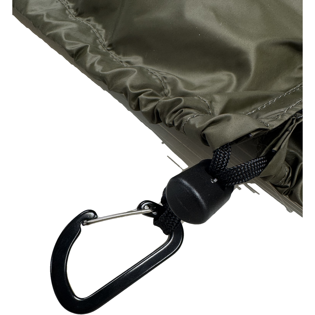Close-up of the shock cord toggle and carabiner on the Jacks R Better The Nest Hennessy Hammock underquilt suspension