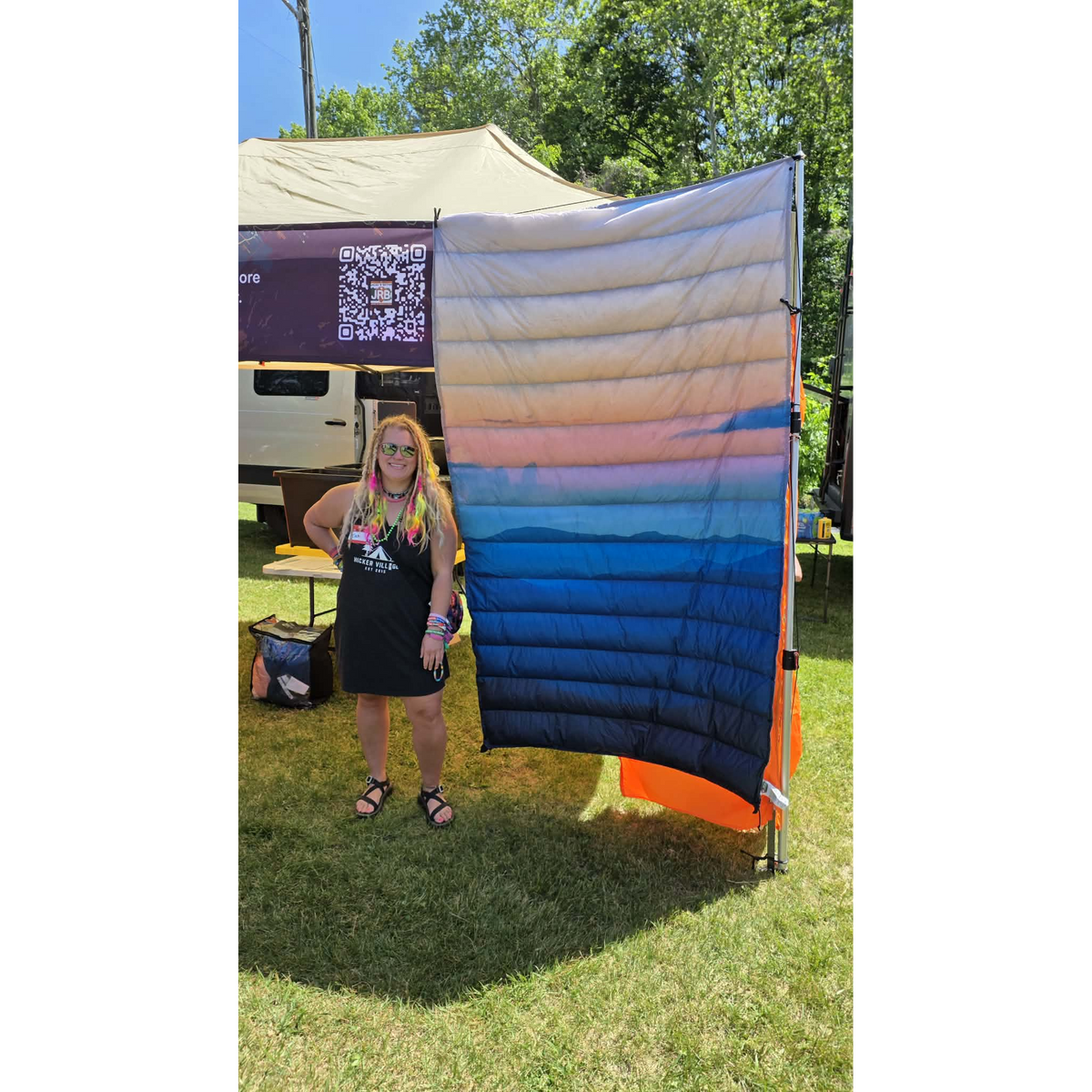 Jacks R Better Wayah Bald Sunset 40°F ultralight quilt shown outdoors on the trail