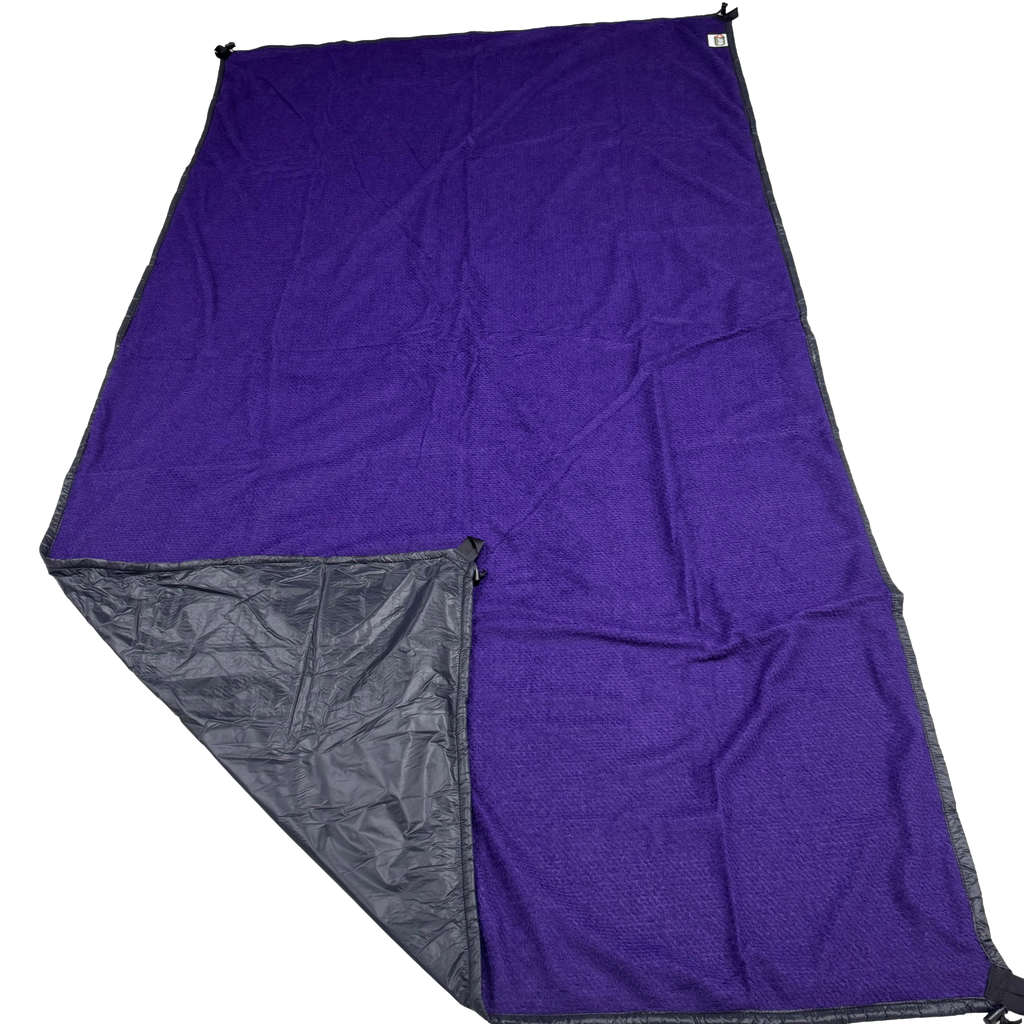Jacks R Better Wind Gap Alpha multifunction wind liner in Purple Grape Alpha Direct with the black Ion 1.1 windproof shell corner folded back